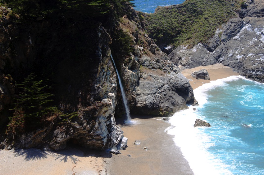 big sur waterfall on beach