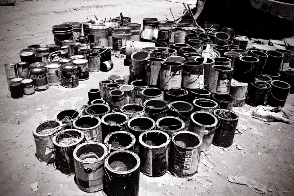 Black and white paint cans