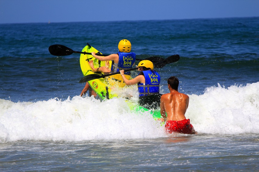 kayaking over the waves