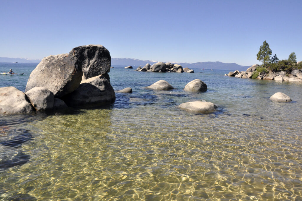 Rocks jutting out from lake tahoe coast
