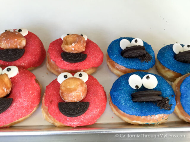 Image result for cookie monster eating donut